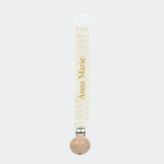 Strikket off-white suttesnor til baby med blødt og sikkert design