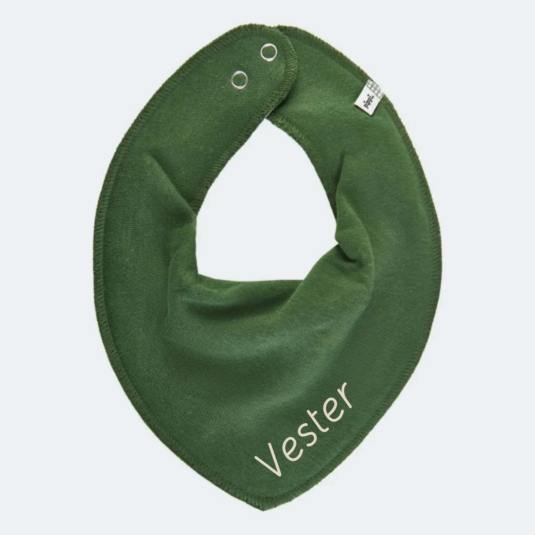 Personlig Pippi savlesmæk i grøn med broderet navn Vester, blødt og økologisk materiale, justerbar med trykknapper.