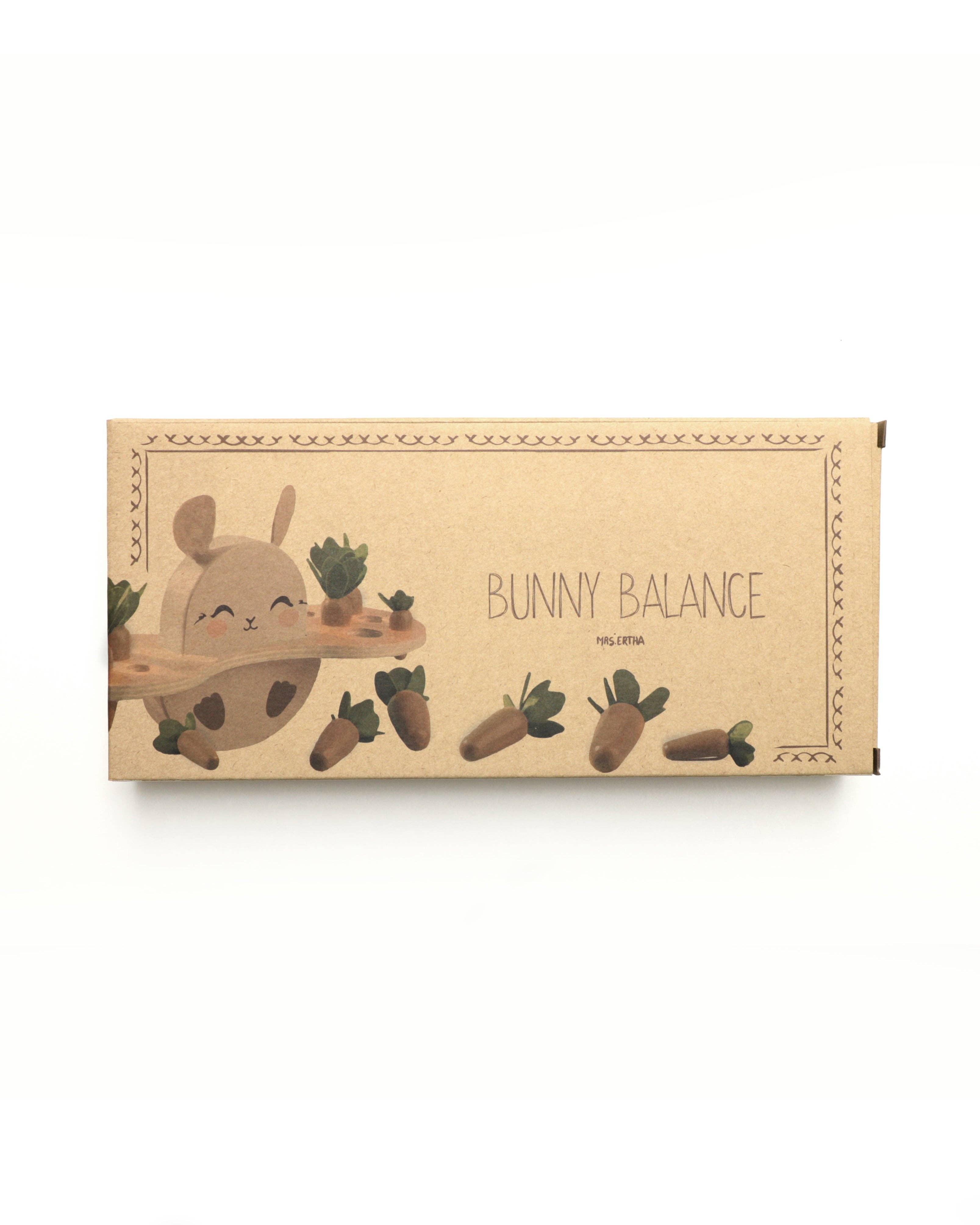 Papæske til Bunny Balance Montessori trælegetøj med illustration af kanin og gulerødder.