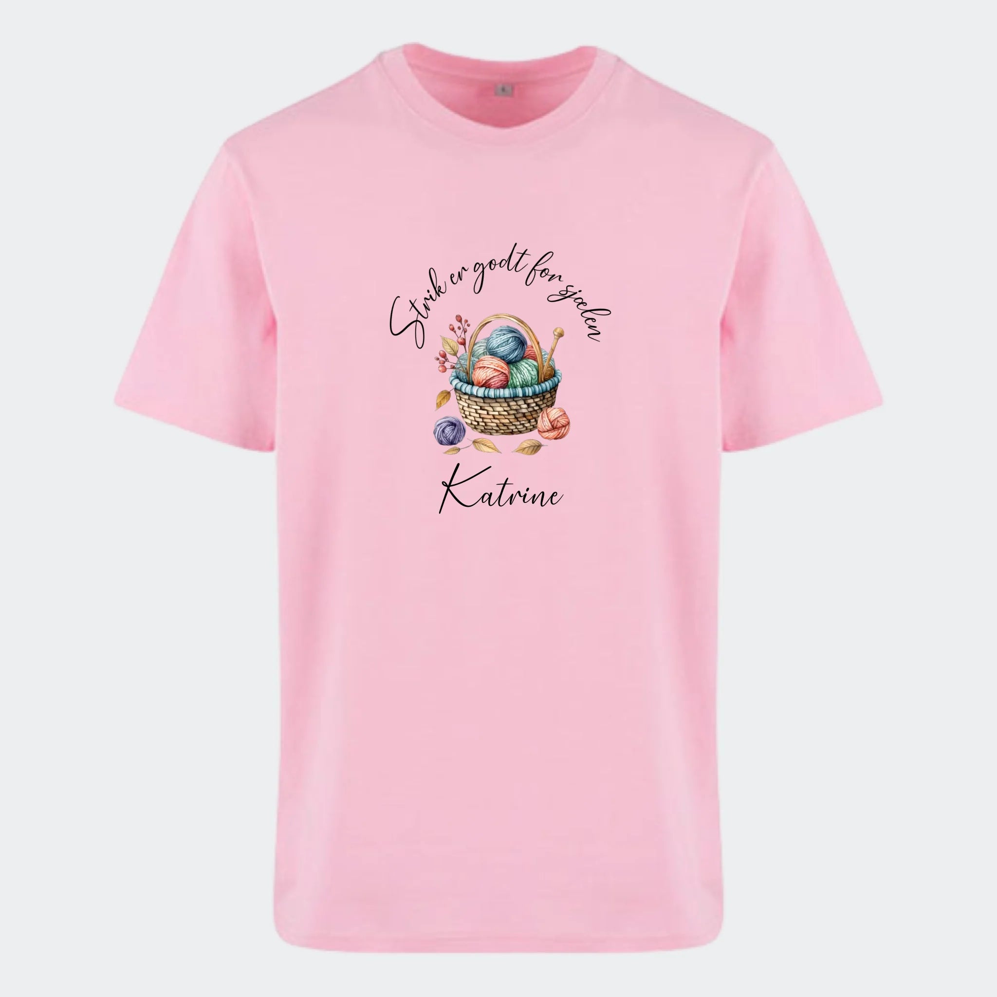 T-shirt – Strik er godt for sjælen. Se motiver, lyserød, set forfra