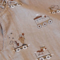 Flor_musselin_poncho-Poncho-NU567-Carnival_train-1