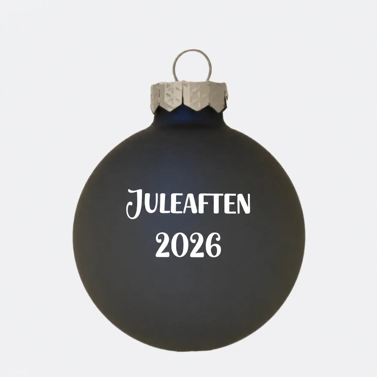 Mat kongeblå julekugle med teksten Juleaften 2026